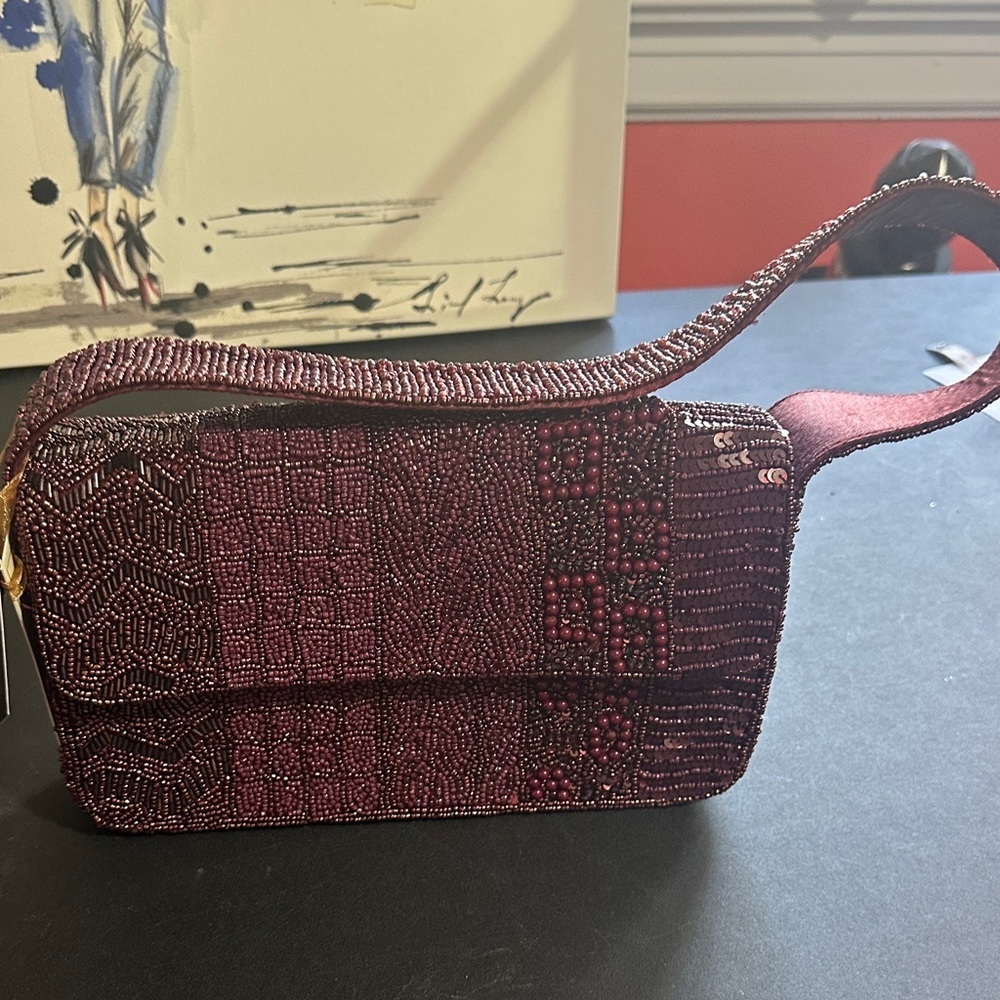 From India to you maroon beaded shoulder bag
